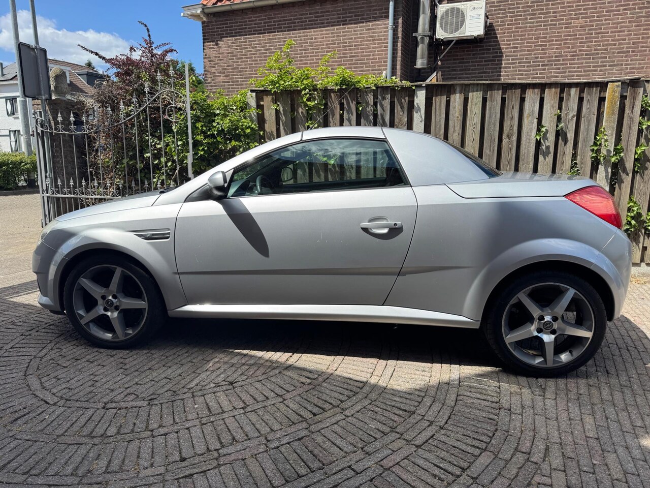 Opel Tigra TwinTop - 1.4-16V Linea Rosso 1.4-16V Linea Rosso - AutoWereld.nl