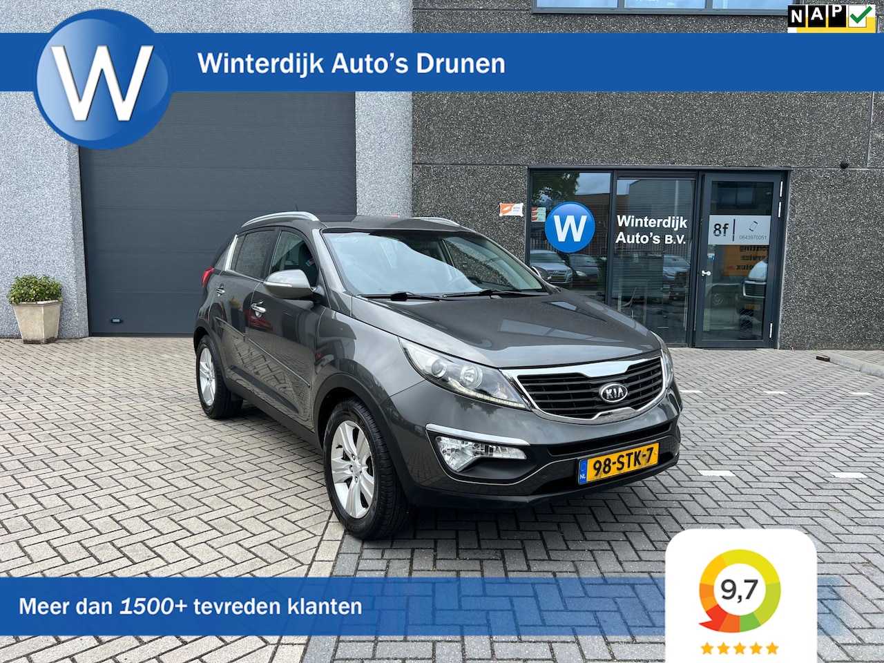 Kia Sportage - 2.0 X-ecutive Plus Pack Automaat Clima Cruise Navi Pdc Nap - AutoWereld.nl