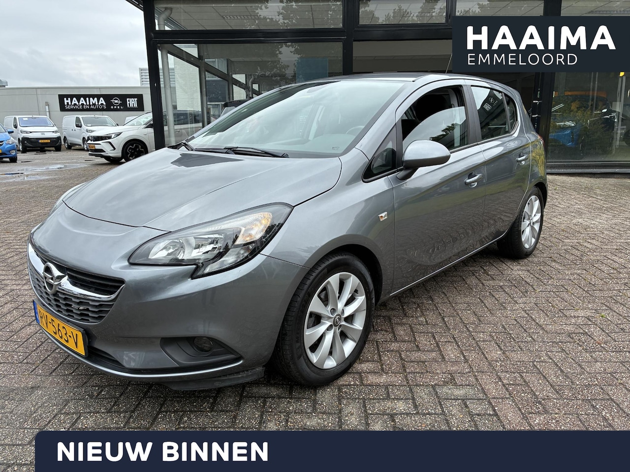 Opel Corsa - 1.4 Favourite 5-Deurs | Airconditioning | Navigatie | Parkpilot | Elektrisch Pakket | Crui - AutoWereld.nl