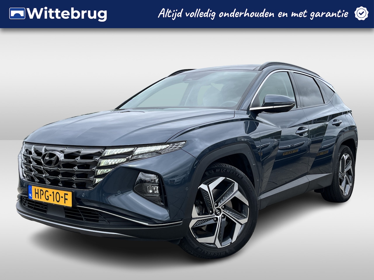 Hyundai Tucson - 1.6 T-GDI PHEV 265 Premium Sky 4WD | Panoramadak | Leder | Stoelverkoeling + Verwarmd | El - AutoWereld.nl
