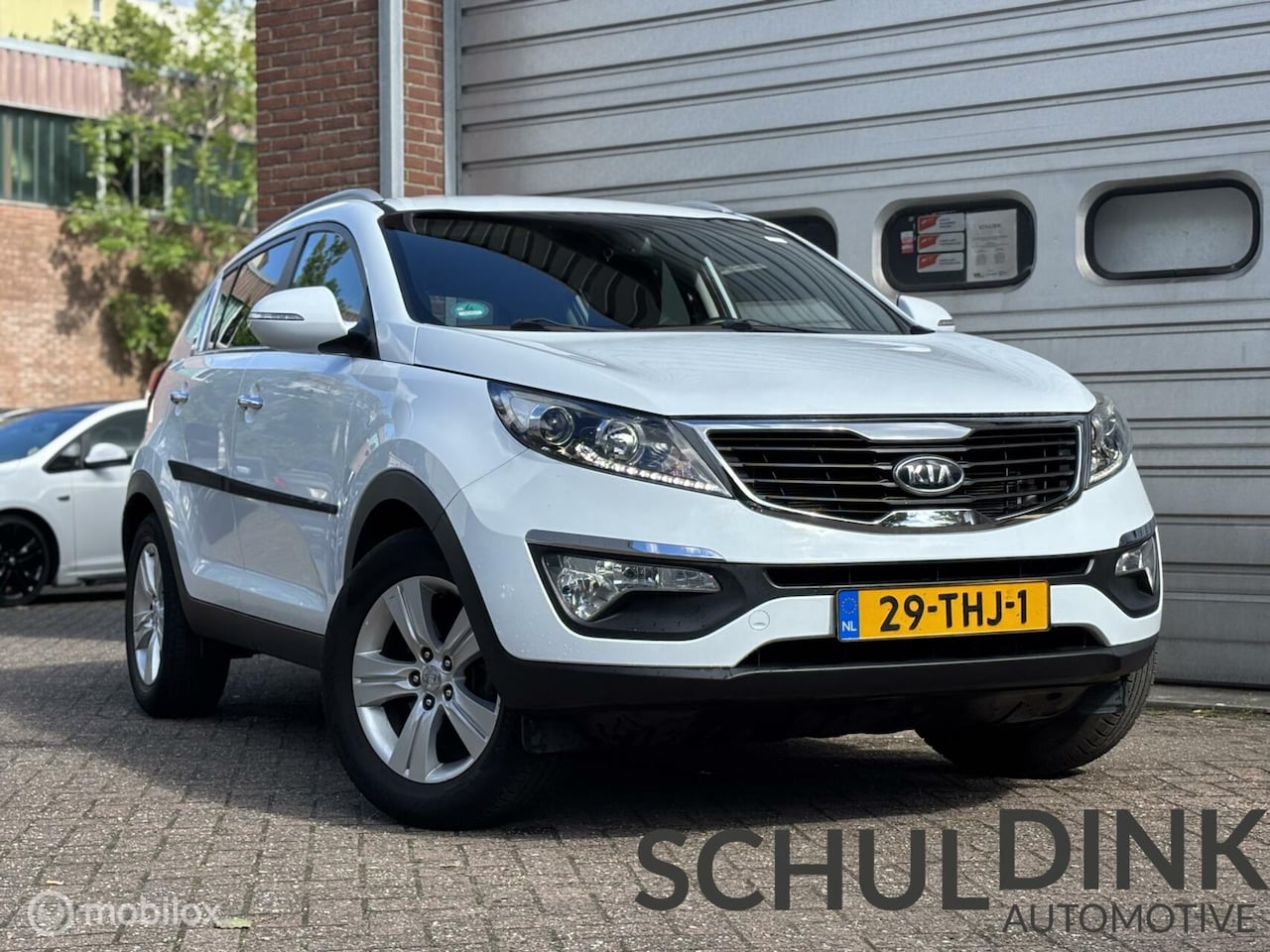 Kia Sportage - 1.6 GDI ISG X-ecutive Plus Pack TREKHAAK|CRUISE CONRTOLR - AutoWereld.nl