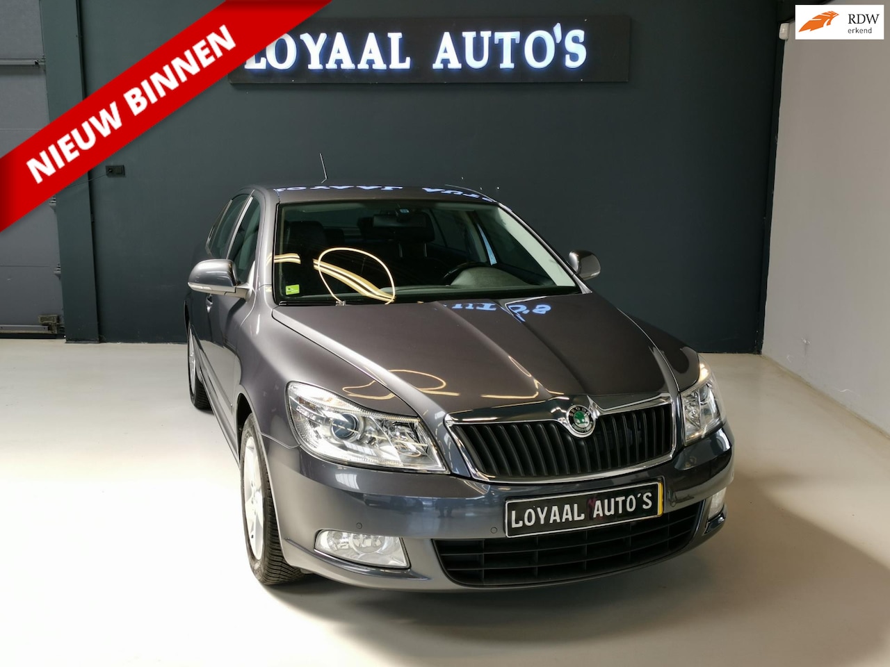 Skoda Octavia - 1.4 TSI Elegance Business Line | AUT | NAVI | AIRCO | CRUISE | TREKHAAK | PDC | APK. - AutoWereld.nl