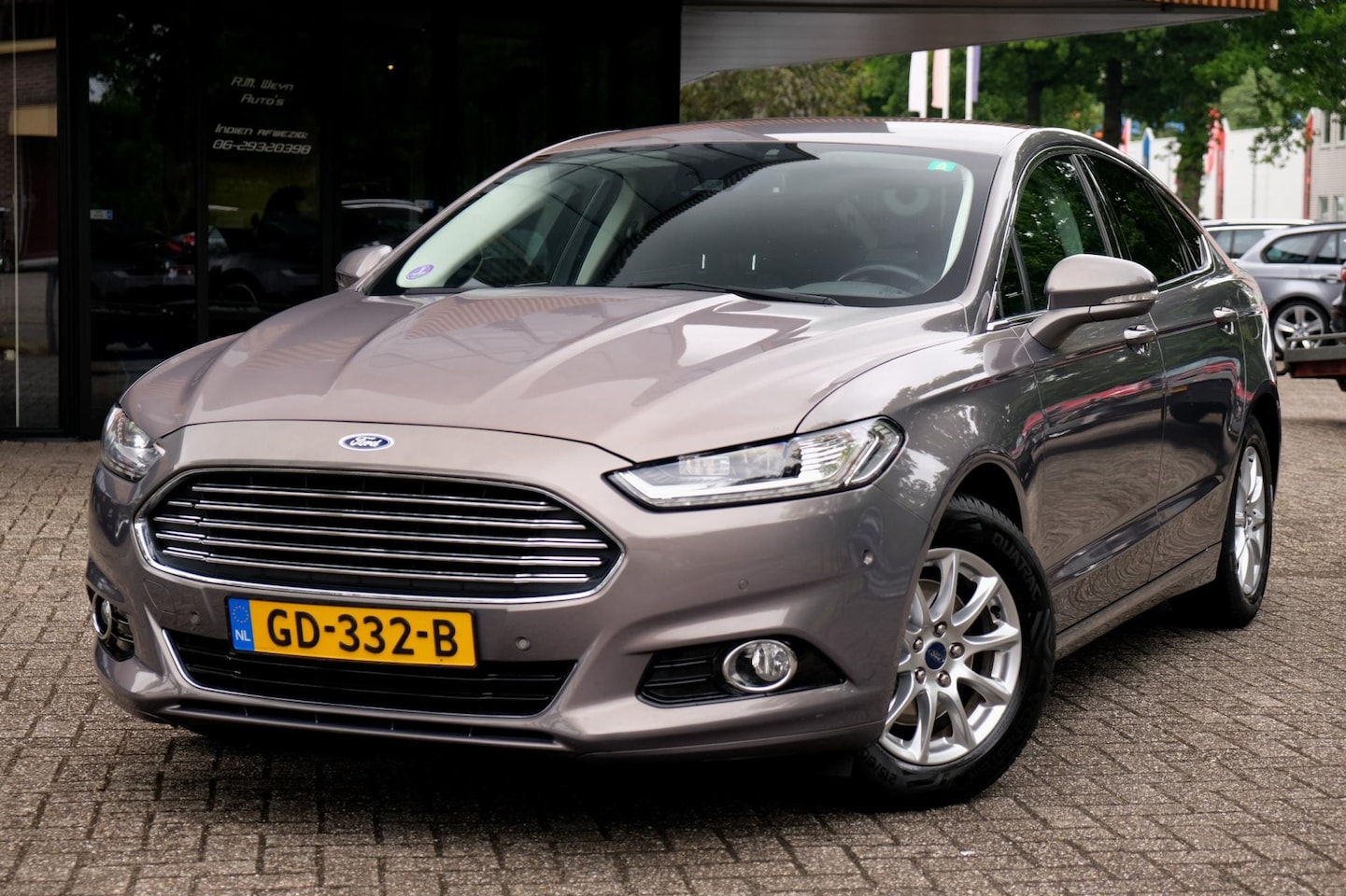 Ford Mondeo - 1.5 Titanium/Trekhaak/Winterpakket/Keyless/Sportstoelen/2e Eigenaar/Dealer Onderhouden - AutoWereld.nl