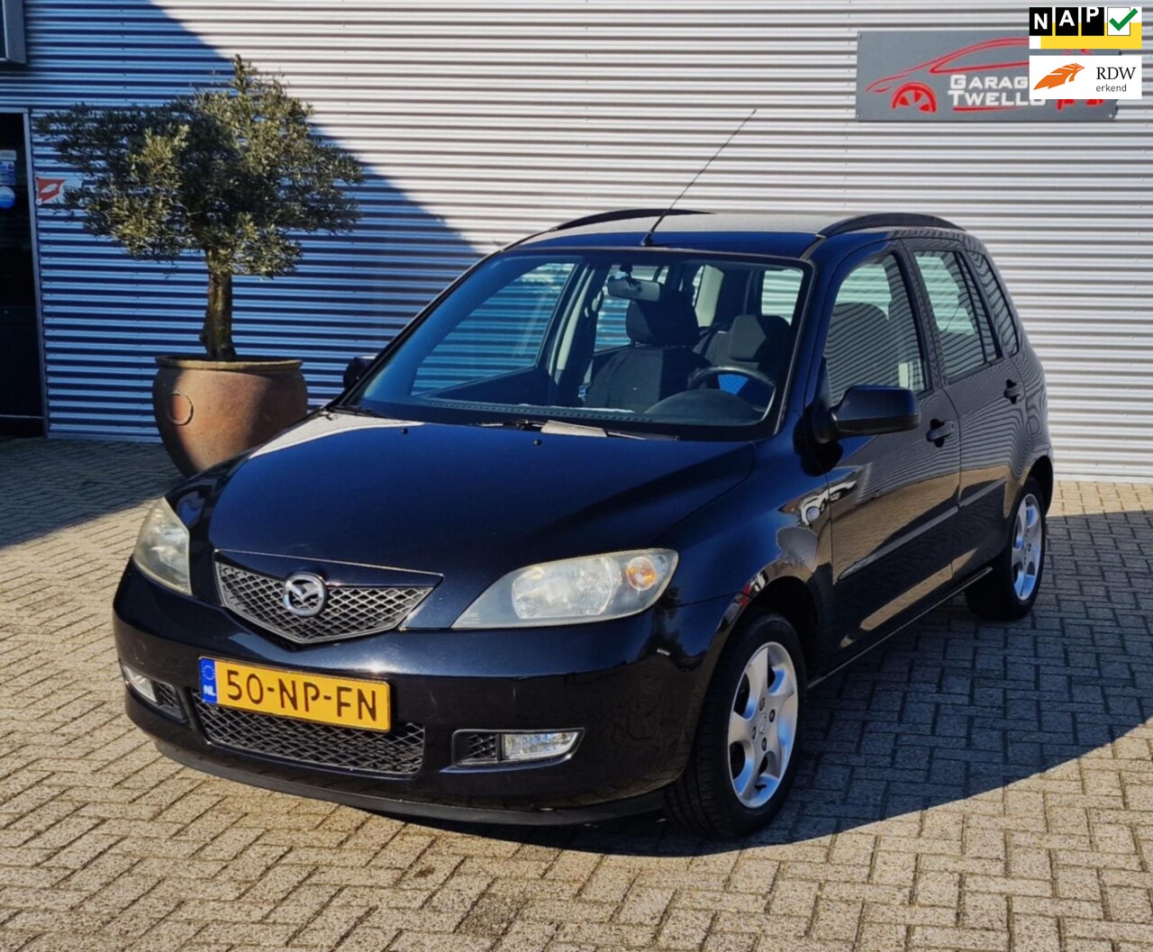 Mazda 2 - 1.4 Touring 1.4 Touring,airco,cv vergrendeling,4xwinterbanden,trekhaak,elektriese ramen,enz,zie fotos - AutoWereld.nl