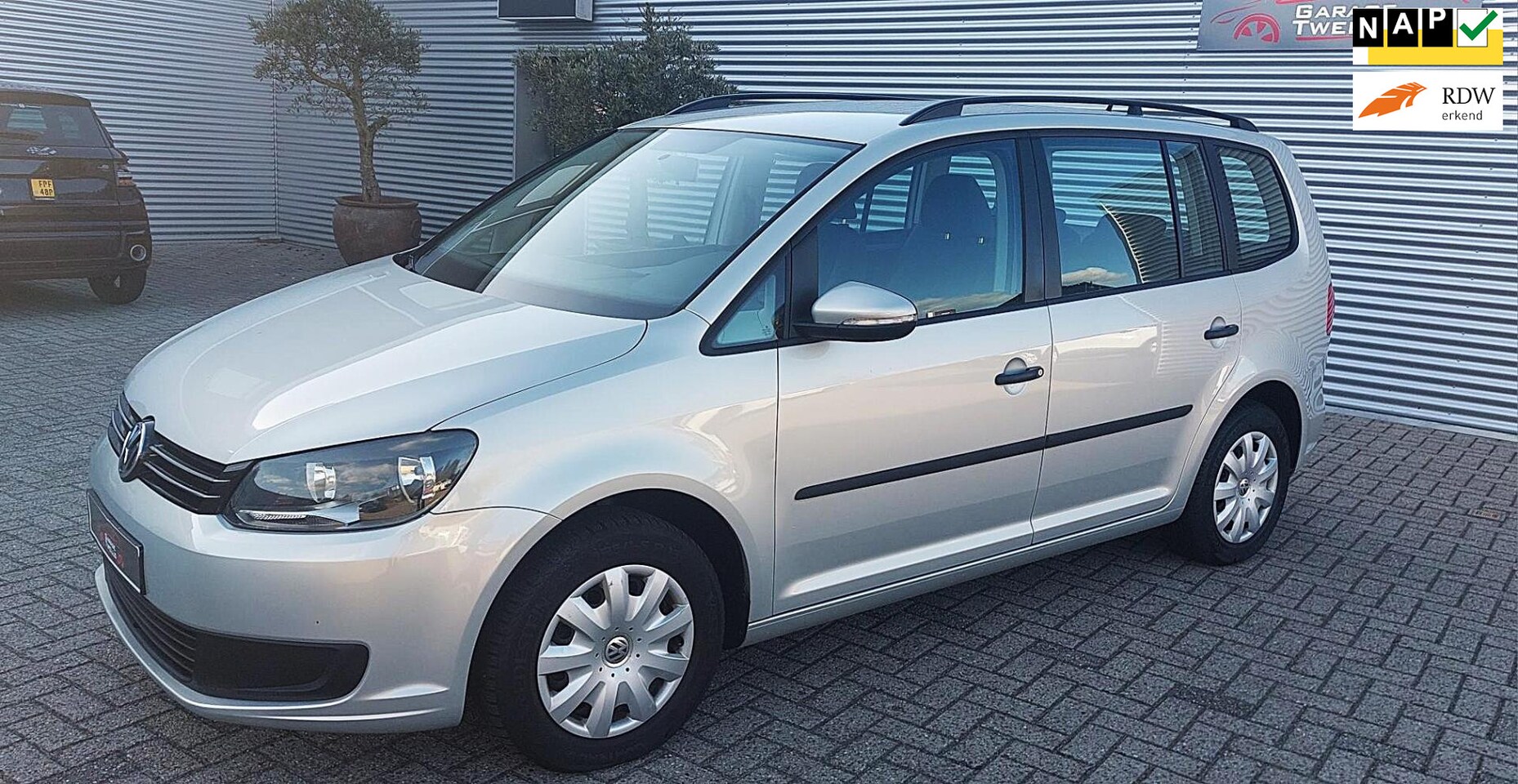 Volkswagen Touran - 1.2 TSI Trendline BlueMotion airco, parktronic achter,dakreling, - AutoWereld.nl