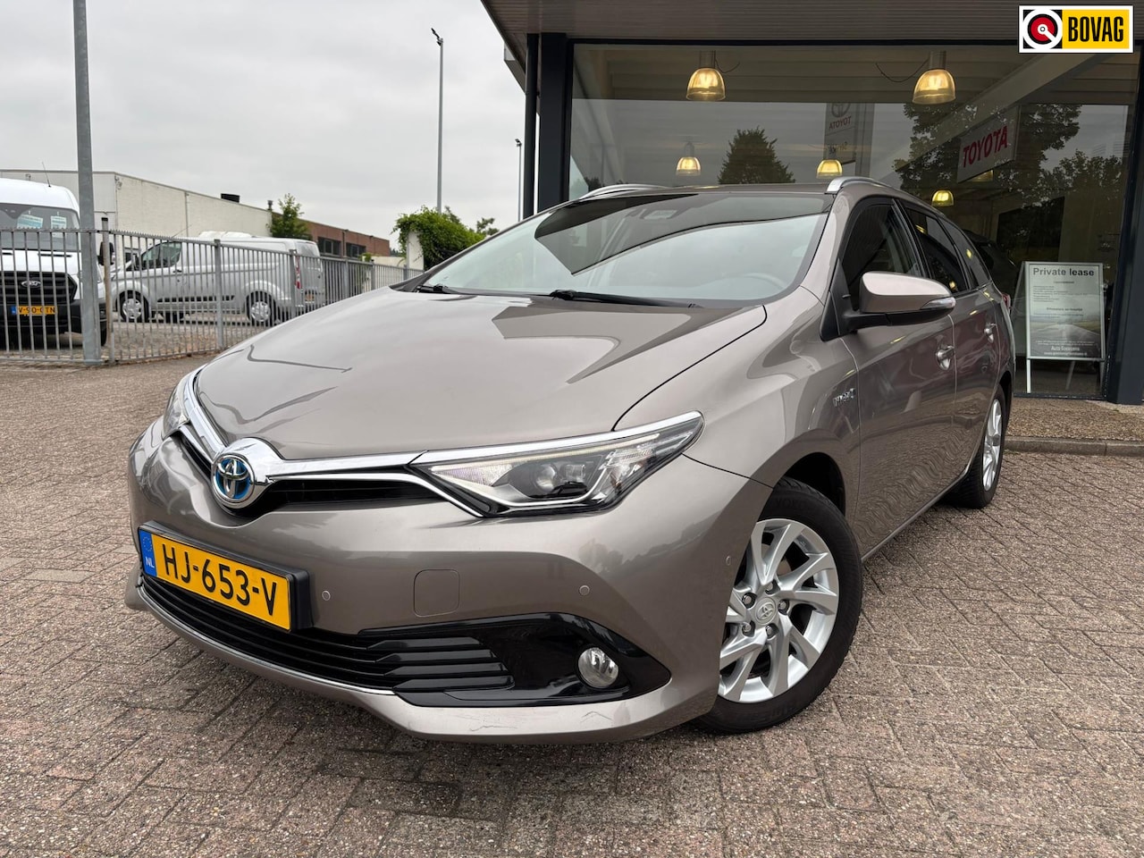 Toyota Auris Touring Sports - 1.8 Hybrid Lease Exclusive|Trekhaak - AutoWereld.nl