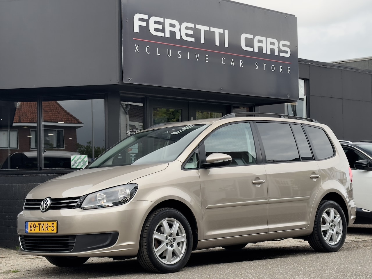 Volkswagen Touran - 1.4 TSI AUT7 COMFORTLINE 7PERS NAVI AIRCO LED LMV PDC - AutoWereld.nl