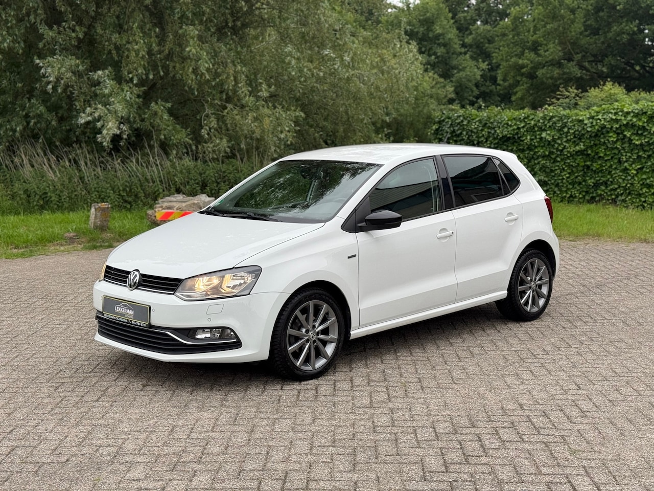 Volkswagen Polo - 1.2 TSI Highline CRUISE I PDC I CLIMA I SPORTSTAND I NWE APK - AutoWereld.nl