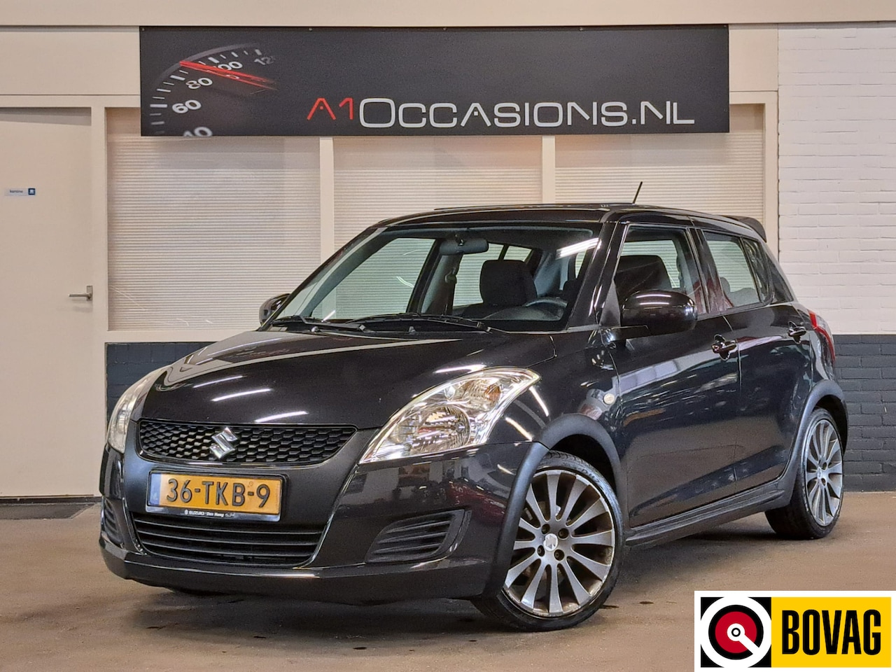 Suzuki Swift - 1.2 Comfort EASSS + SCHUIF-/ KANTELDAK !! - AutoWereld.nl