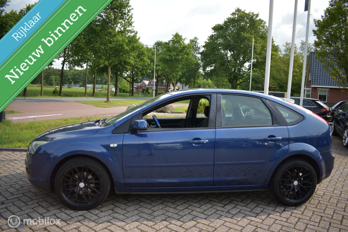 Ford Focus - 1.8-16V Ambiente Flexifuel '08 Airco|Cruise! - AutoWereld.nl