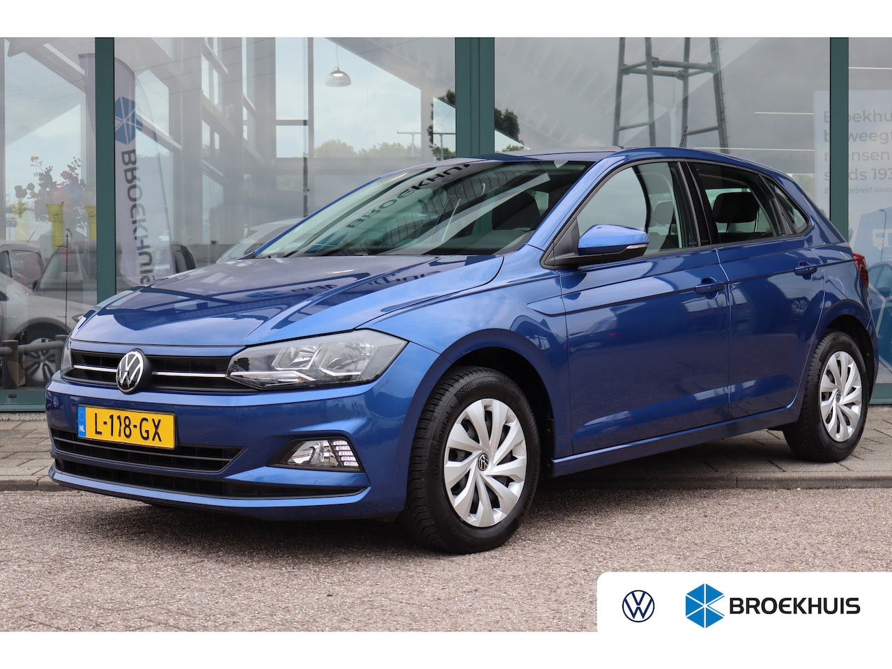 Volkswagen Polo - 1.0 TSI Comfortline | Airco | Buitenspiegels elektrisch verstel- en verwarmbaar | Start/st - AutoWereld.nl