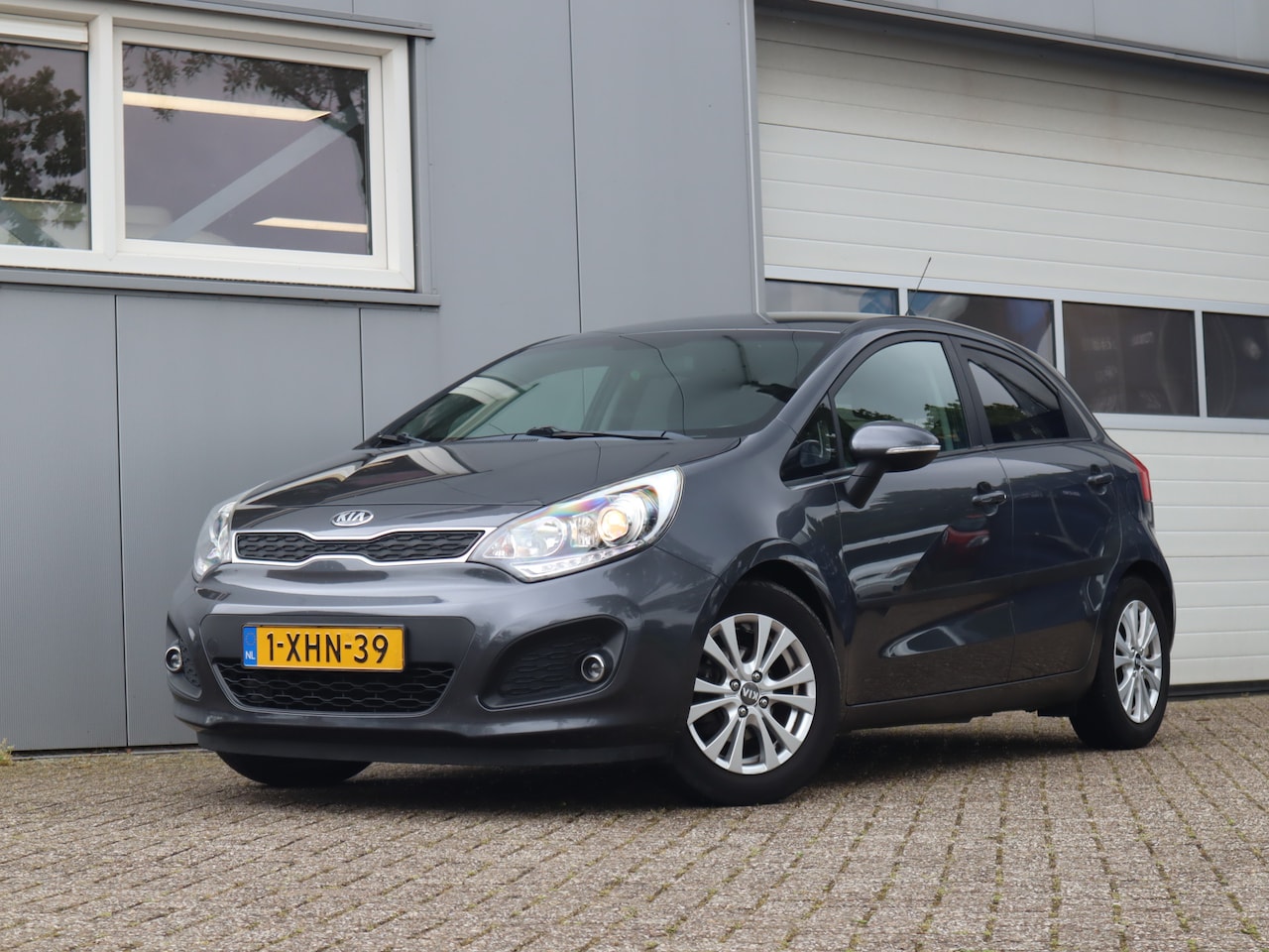Kia Rio - 1.2 CVVT World Cup Edition / Trekhaak / Cruise / Leer - AutoWereld.nl