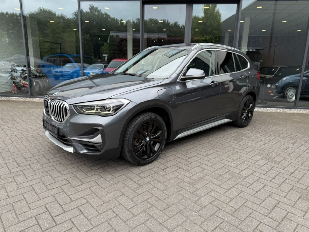 BMW X1 - xDrive25e High Exe,Pano,HeadUp,Harman/Kardon,Memory,Leer - AutoWereld.nl