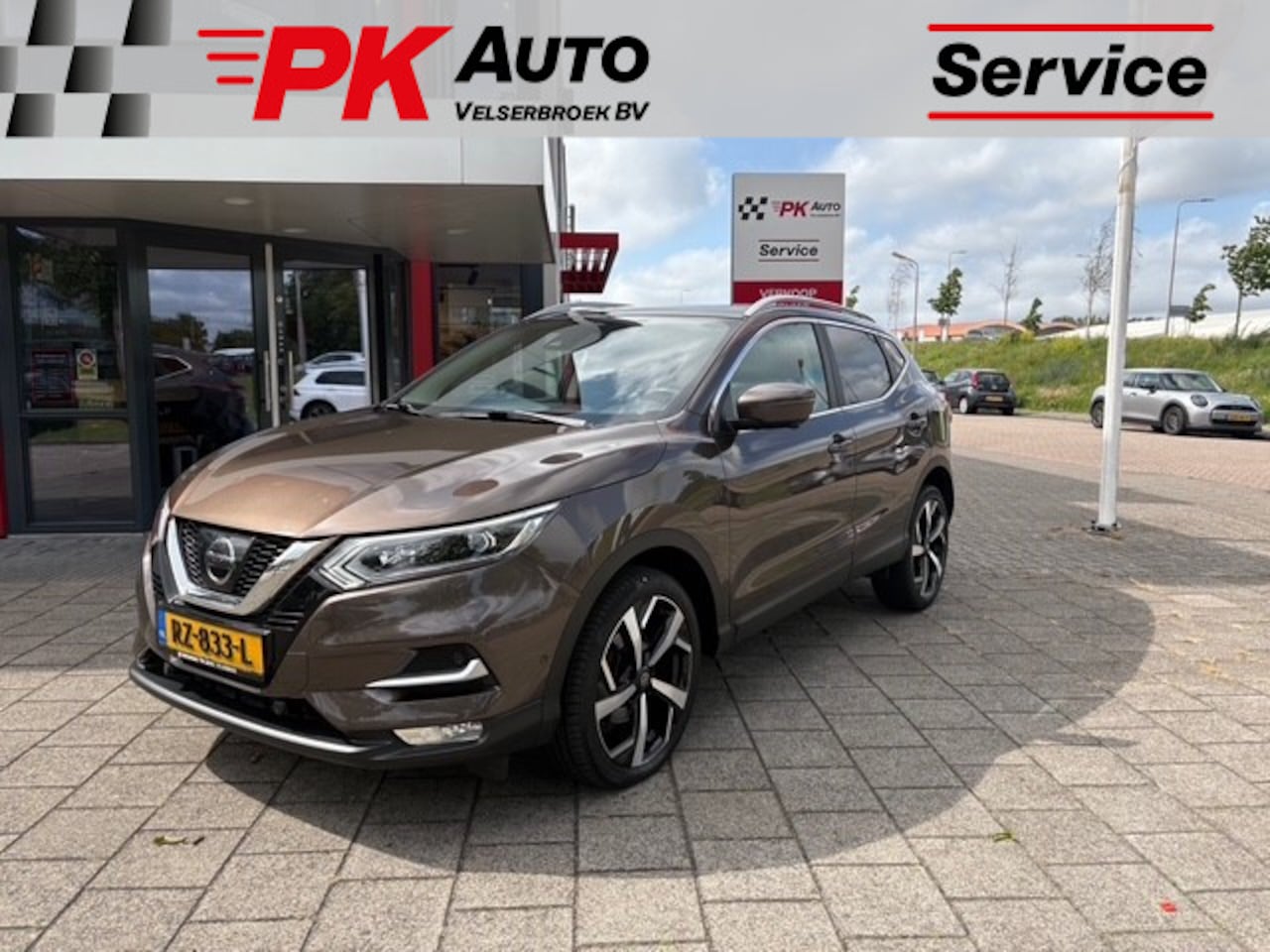 Nissan Qashqai - 1.2 Tekna + | Navi | Cruise | 360 Camera | 81.217 km Dealeronderhouden - AutoWereld.nl