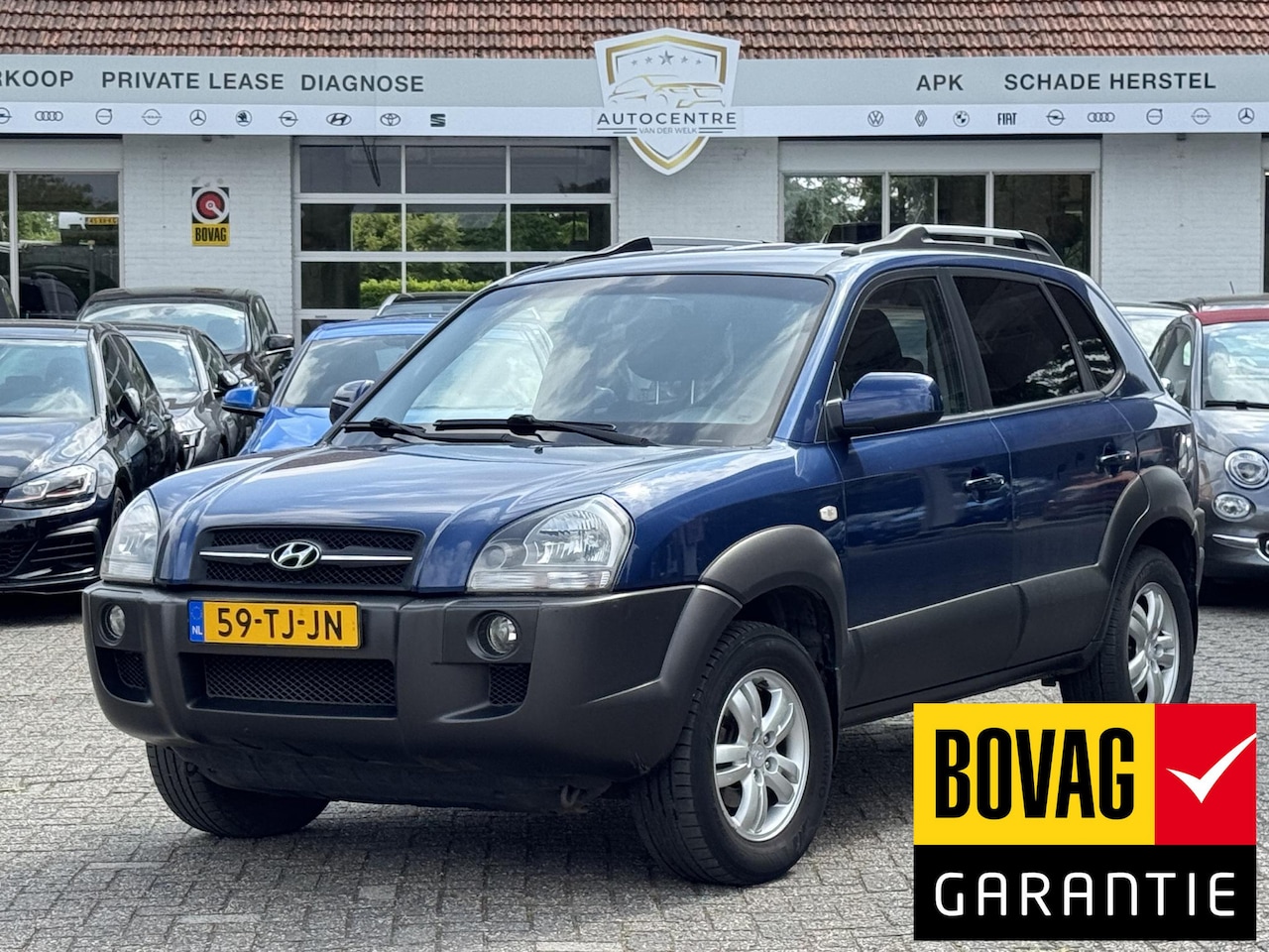 Hyundai Tucson - 2.0i Dynamic AIRCO | TREKHAAK | NIEUWE APK ! - AutoWereld.nl