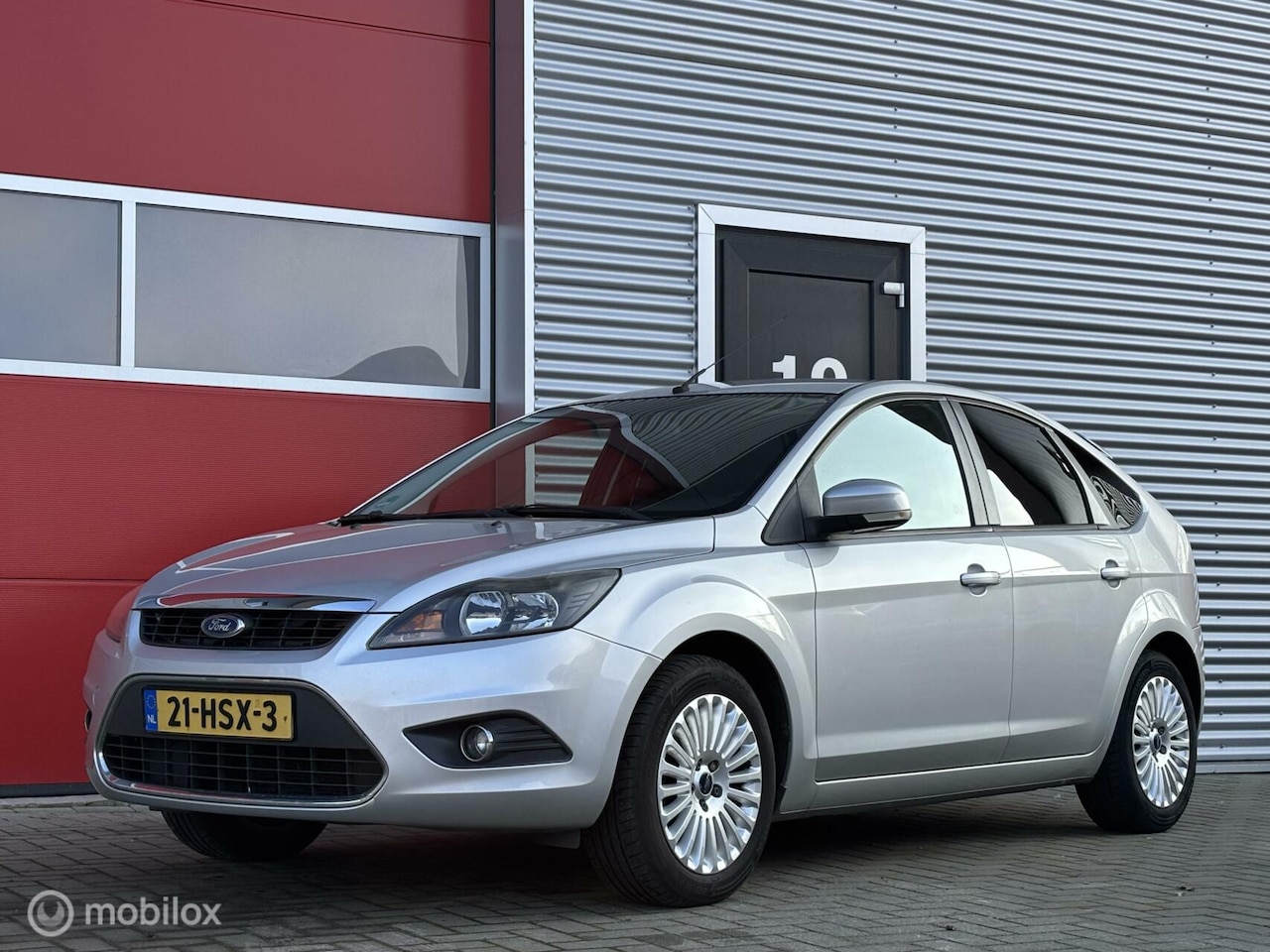 Ford Focus - 1.6 Titanium cruise/trekhaak/pdc/clima/navi/5deurs - AutoWereld.nl