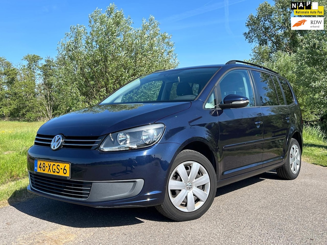 Volkswagen Touran - 1.2 TSI Comfortline BlueMotion 7-persoons / Airco / Navigatie / Trekhaak / Goed Onderhoude - AutoWereld.nl