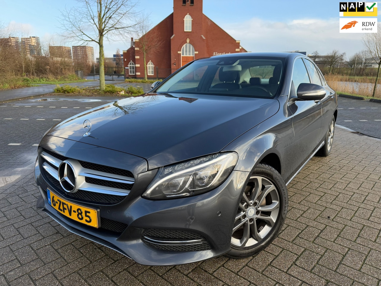 Mercedes-Benz C-klasse - 180 Ambition*APK*NAP*NAVI*Cruise*Trekhaak*Elekt-Stoelen+Ramen*Velgen*Leer - AutoWereld.nl