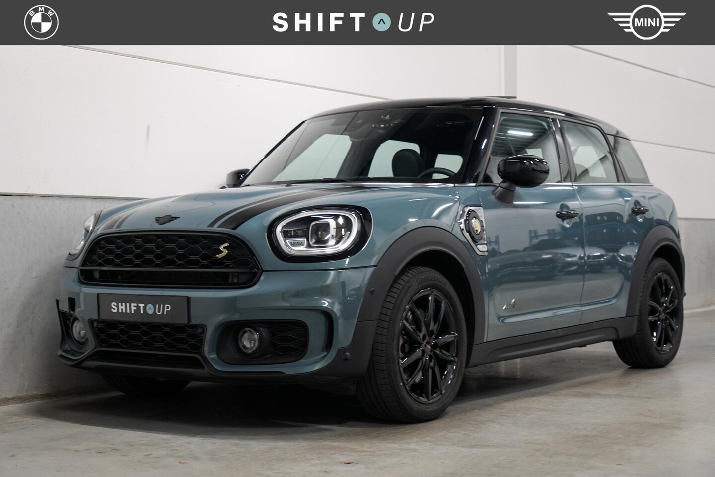 MINI Countryman - Mini 2.0 Cooper S E ALL4 Panoramadak | JCW | Head Up | Camera - AutoWereld.nl