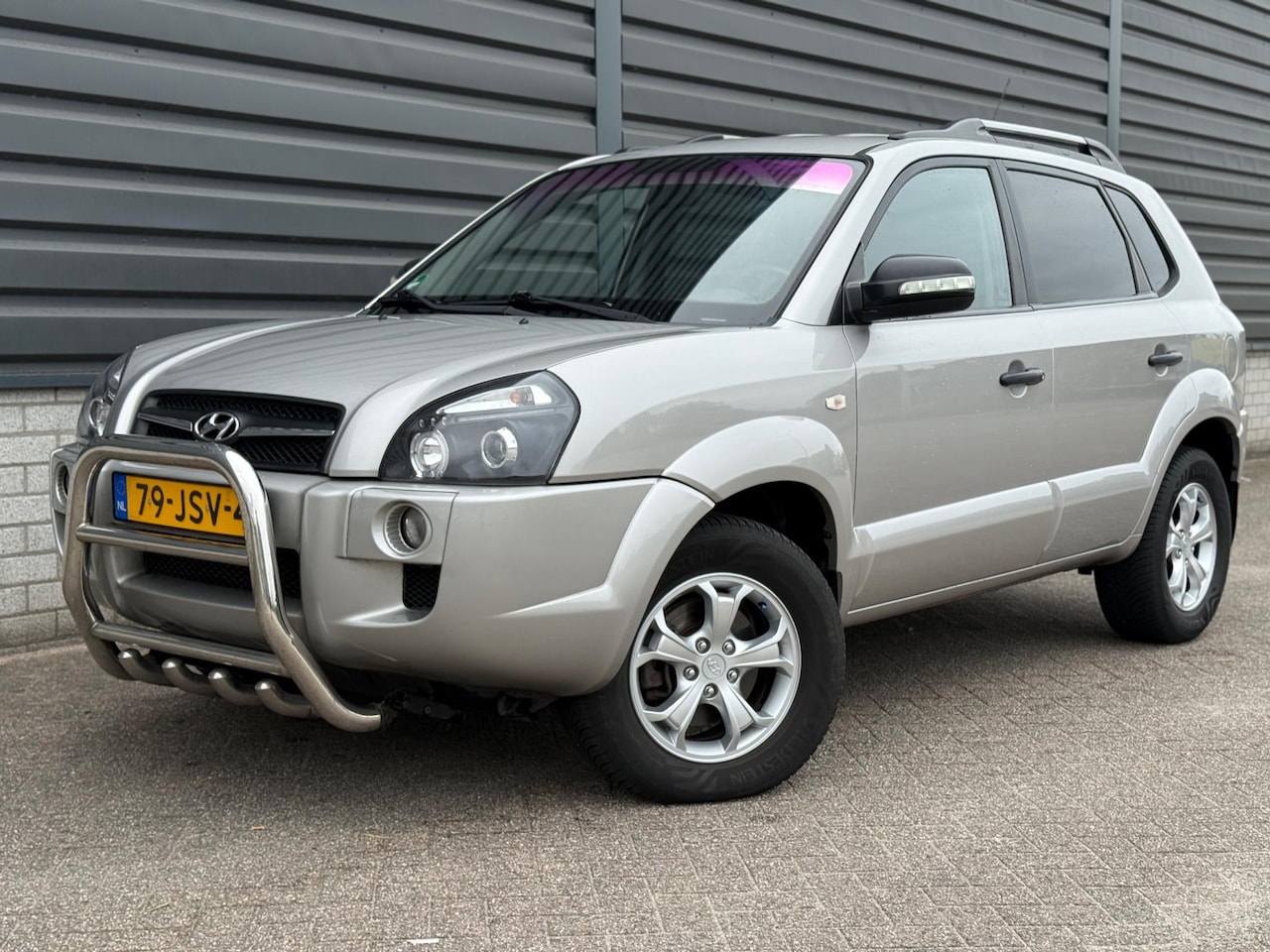 Hyundai Tucson - 2.0i Dynamic Executive Cruise Airco NIEUWE KOPPELING - AutoWereld.nl