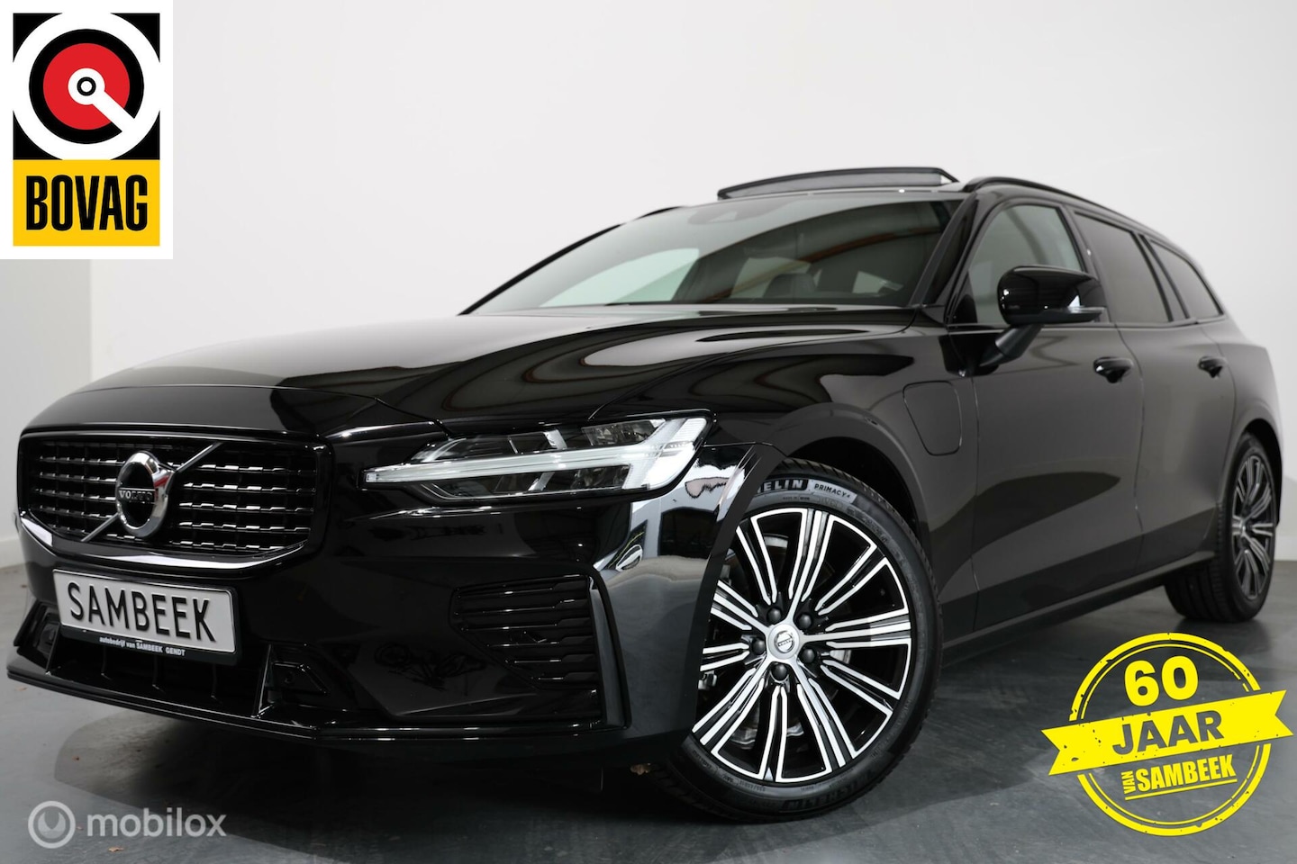 Volvo V60 - 2.0 T6 Recharge AWD R-Design - PANO - ACC - TREKHAAK - AutoWereld.nl