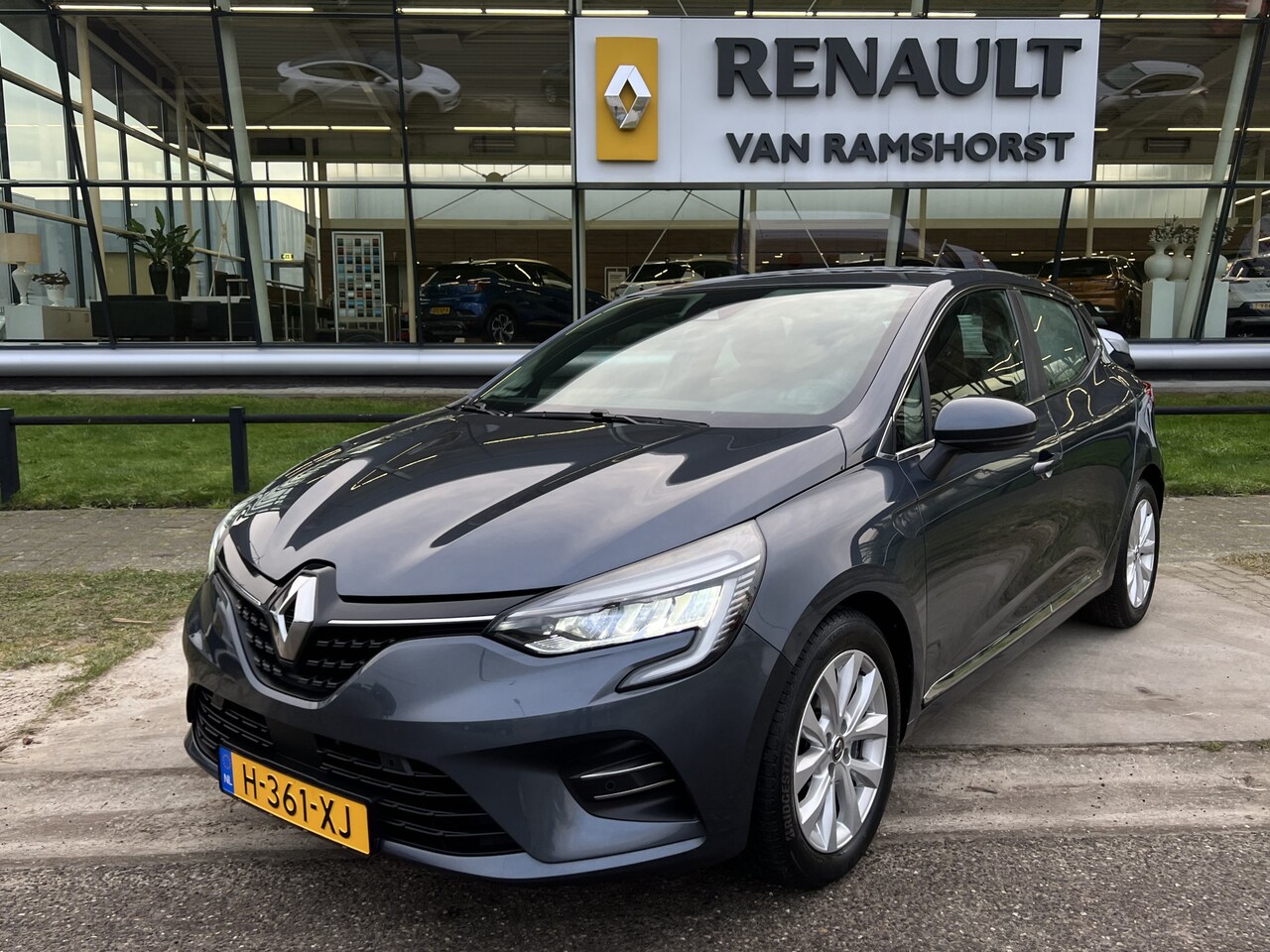 Renault Clio - 1.0 TCe Intens / Trekhaak / Leder / Camera / Cruise / Zwarte hemel / Applecarplay - Androi - AutoWereld.nl