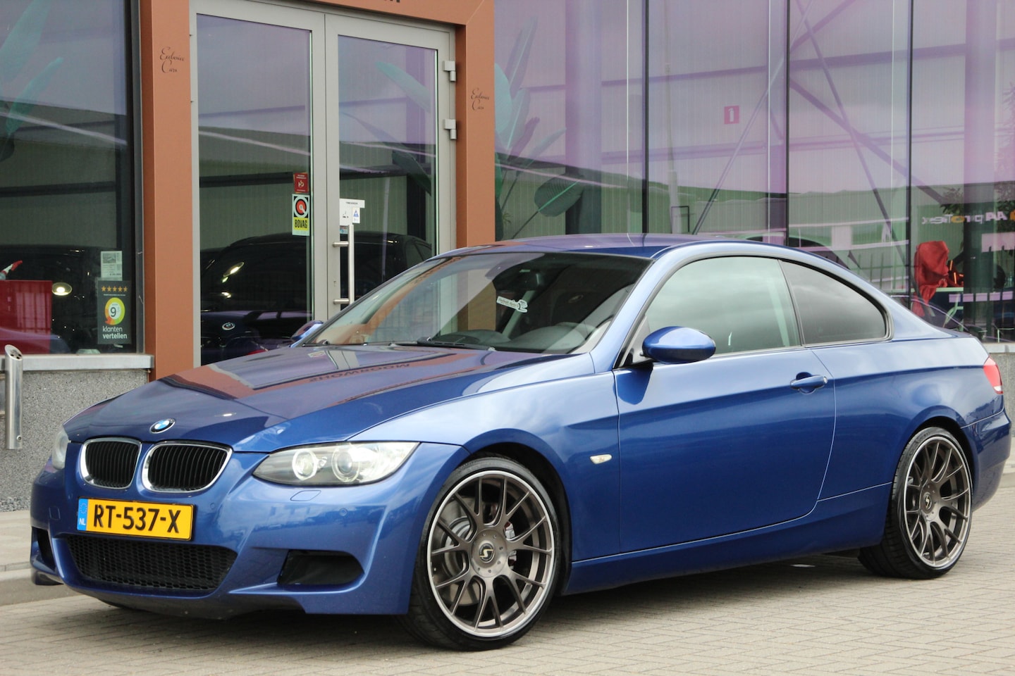 BMW 3-serie Coupé - 335i High Executive M Pakket | 306PK | DCT - AutoWereld.nl