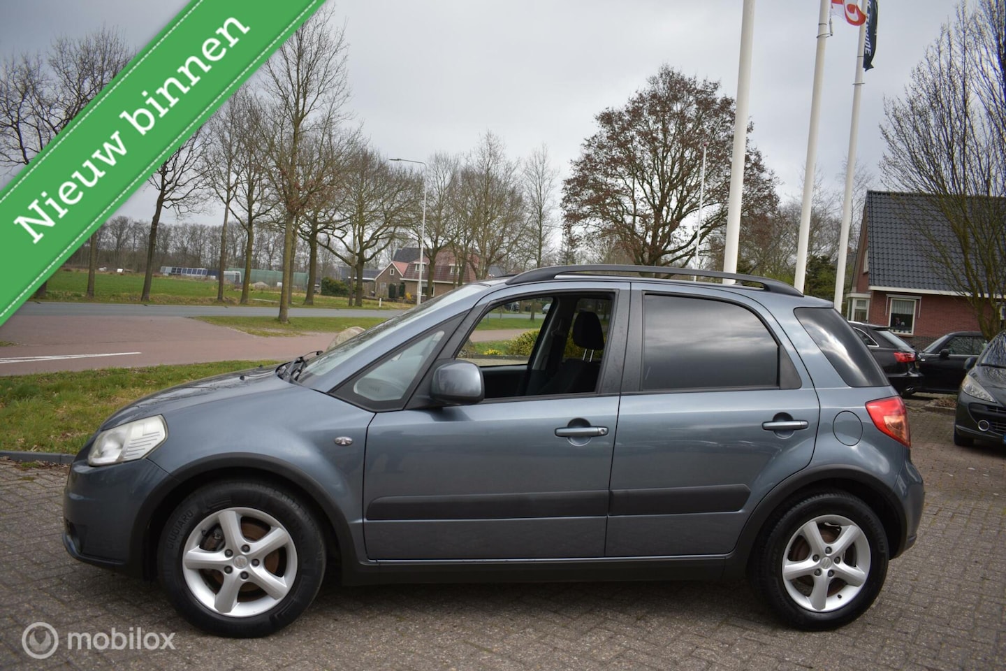 Suzuki SX4 - 1.6 Comfort 1.6 Comfort 5DRS, Hoge instap|Cruise|Airco! - AutoWereld.nl