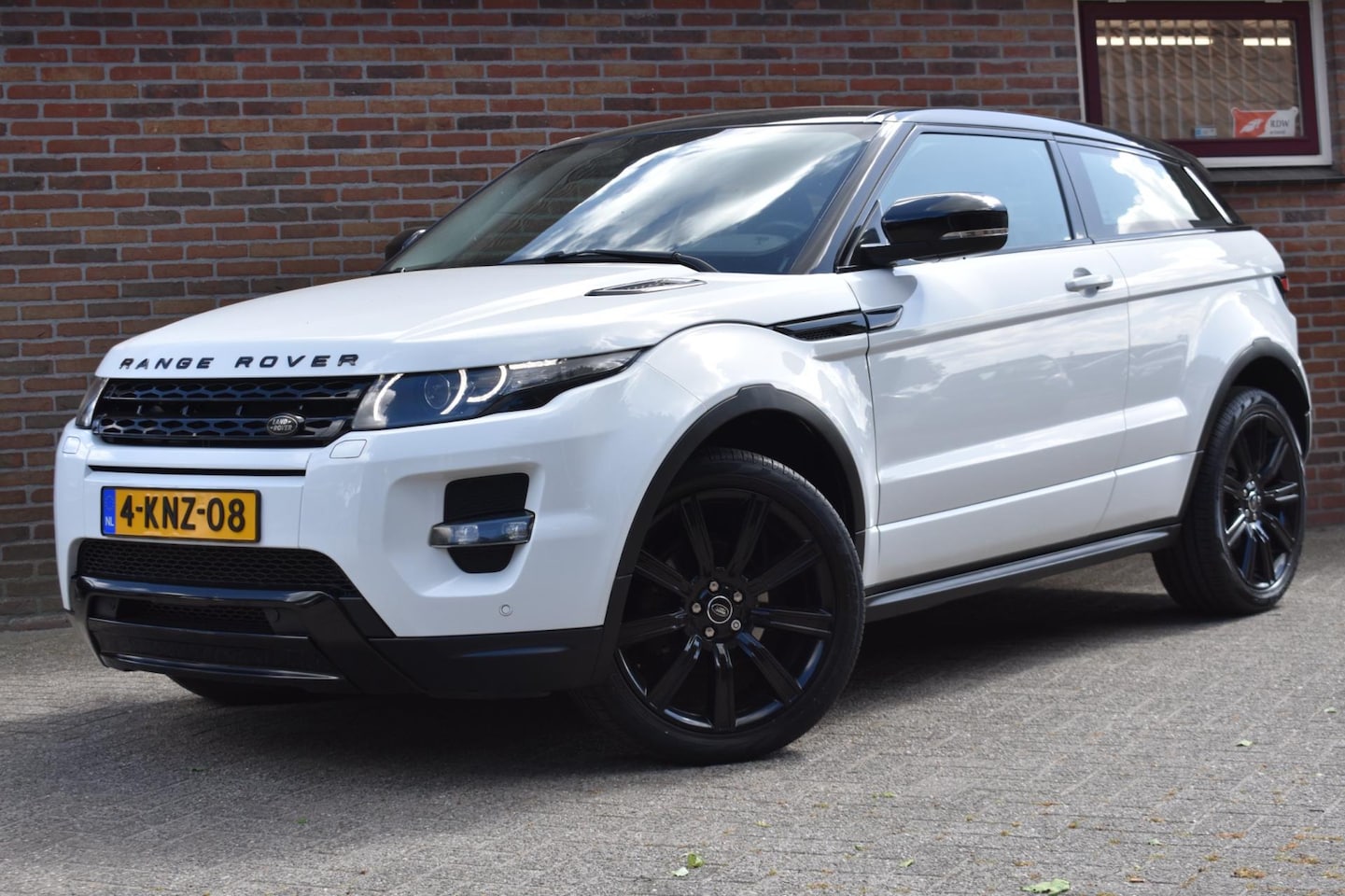 Land Rover Range Rover Evoque Coupé - 2.0 Si 4WD Prestige '13 Navi Clima Cruise Leder Inruil mogelijk - AutoWereld.nl