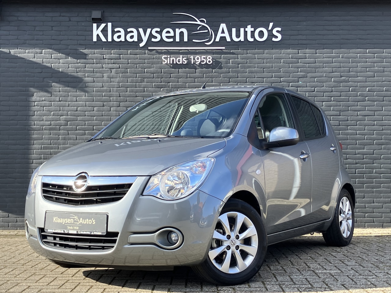 Opel Agila - 1.2 Edition AUT. | 1e eigenaar | airco | lichtmetalen velgen | trekhaak | elektrisch pakke - AutoWereld.nl