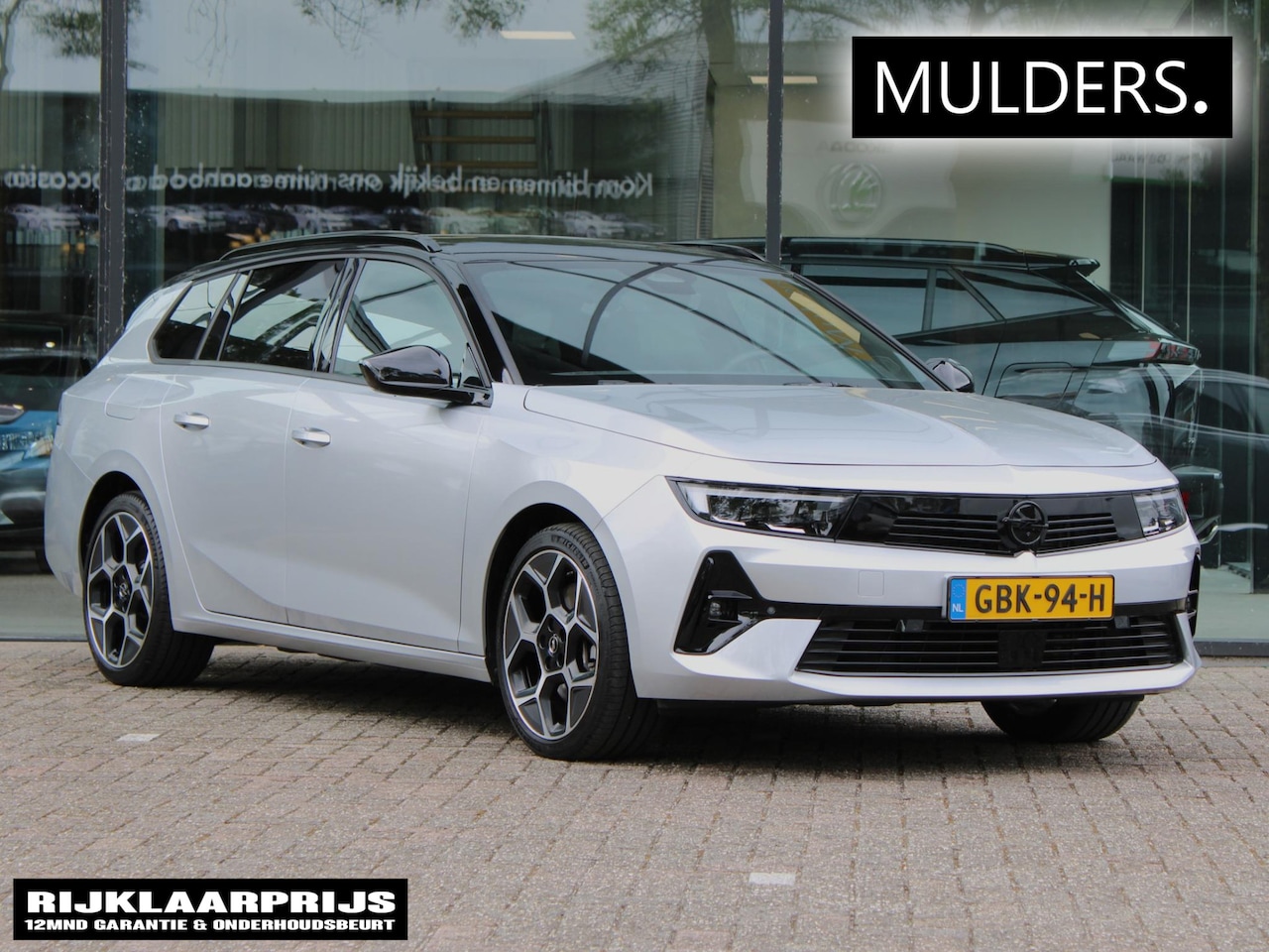 Opel Astra Sports Tourer - 1.6 Turbo Plug In Hybrid Ultimate | Navi / Camera / Alcantara - AutoWereld.nl