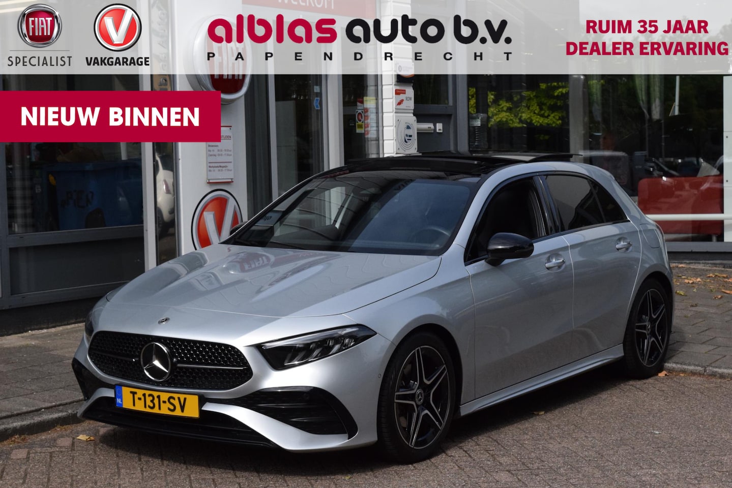 Mercedes-Benz A-klasse - 180 AMG Line|Dak|Sfeer|Camera|Led|18" - AutoWereld.nl