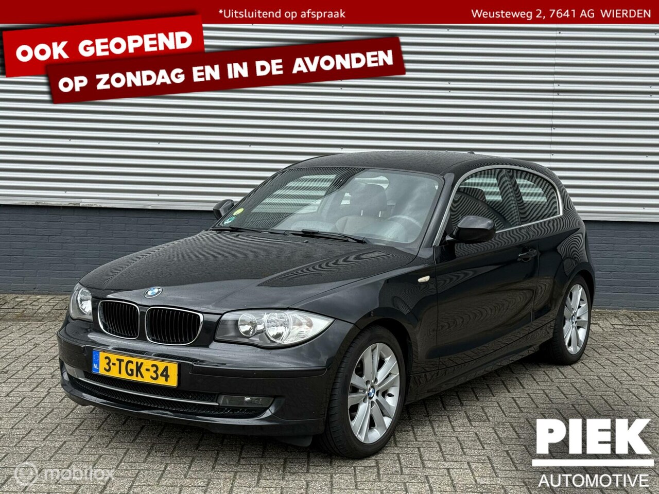 BMW 1-serie - 123d High Executive AUTOMAAT - AutoWereld.nl