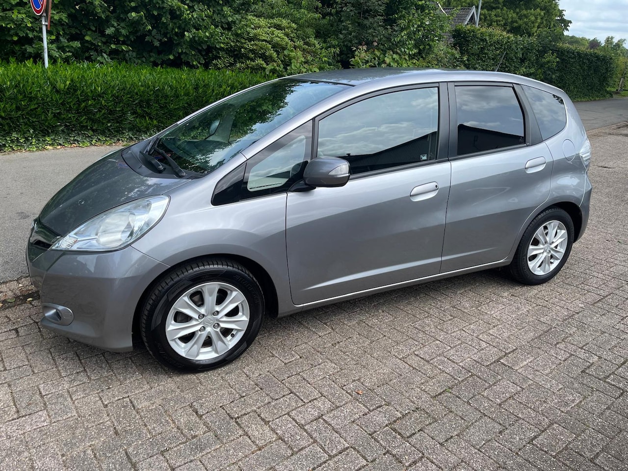 Honda Jazz - 1.4 HYBRID CVT Business Mode Navi Cruise C. - AutoWereld.nl