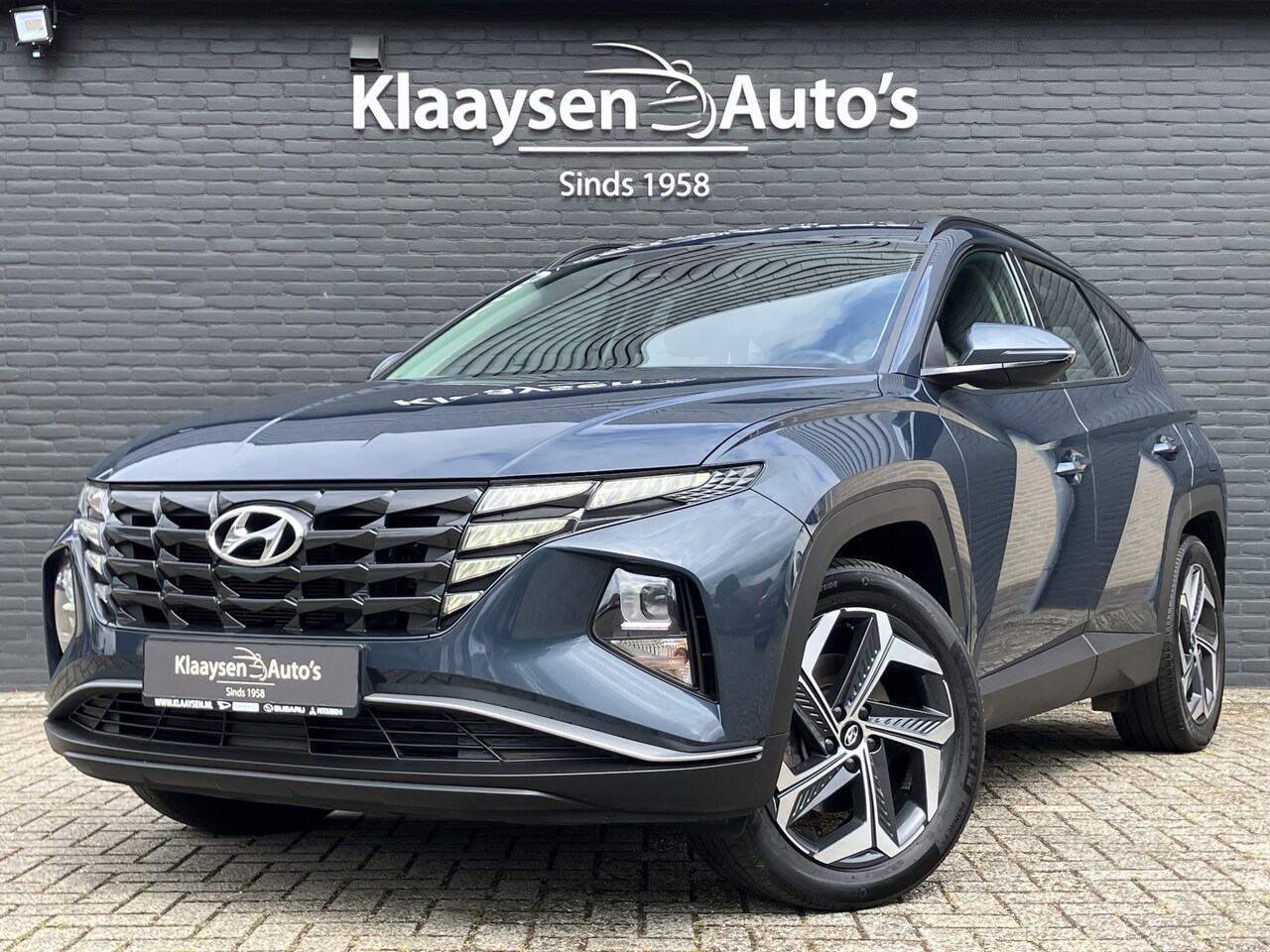 Hyundai Tucson - 1.6 T-GDI PHEV 265 pk Comfort 4WD AUT. | 1e eigenaar | dealer onderhouden | navigatie | tr - AutoWereld.nl