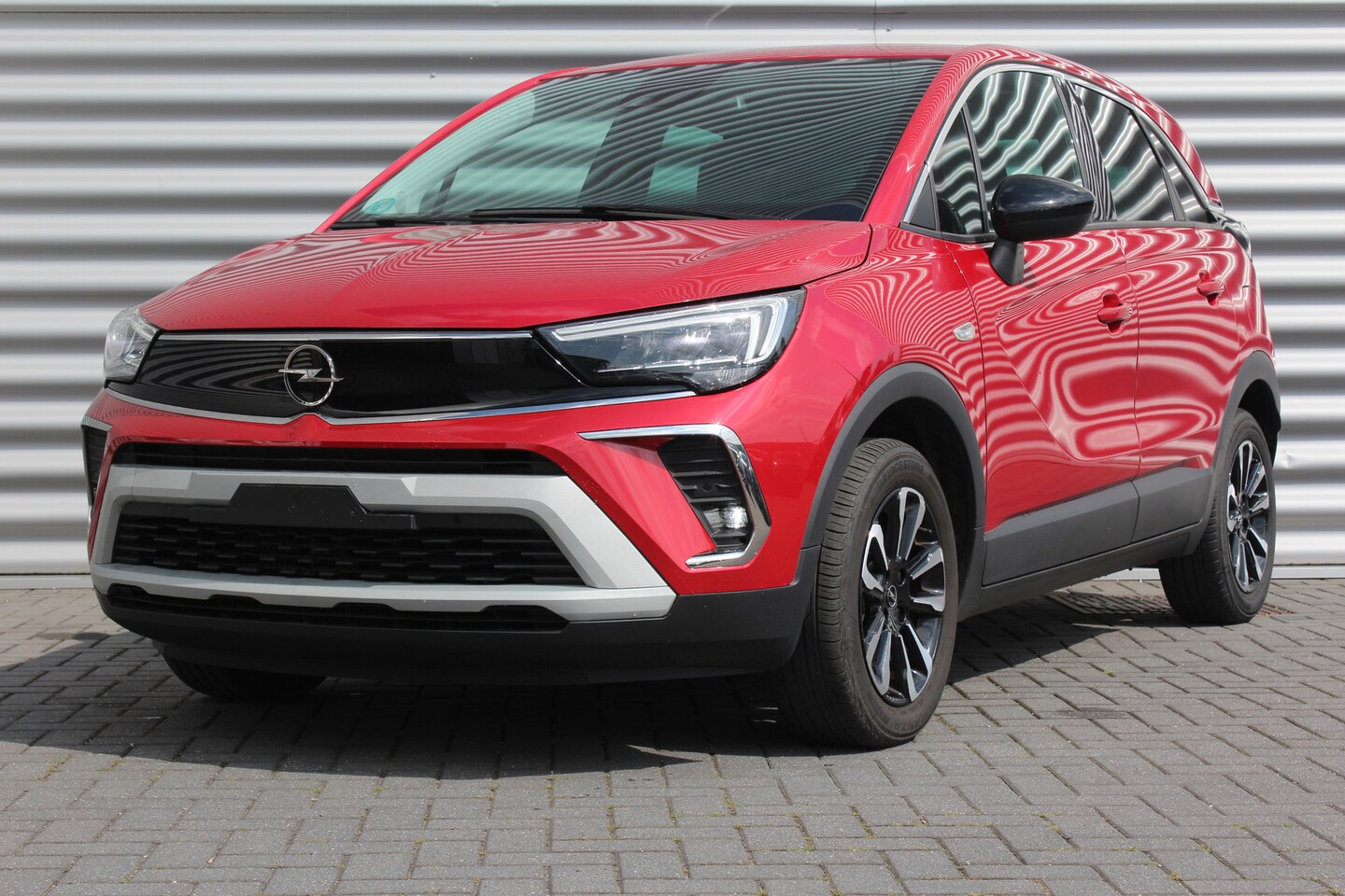 Opel Crossland - 1.2 TURBO 110PK ELEGANCE LEVEL 4 / NAVI / LEDER / CLIMA / AGR / 16" LMV / CAMERA / FULL-LE - AutoWereld.nl