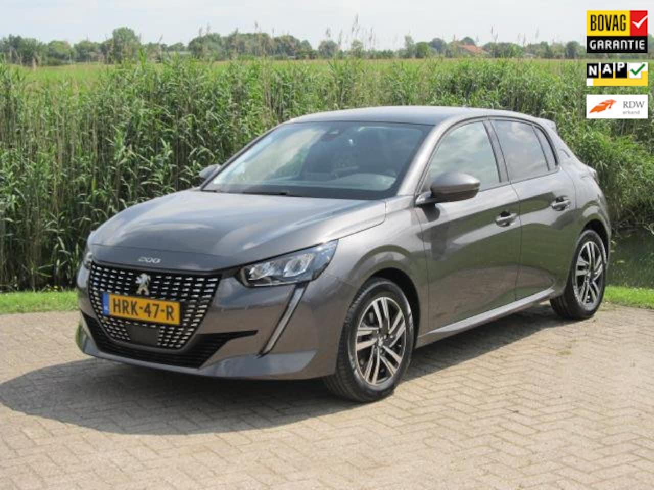 Peugeot 208 - 1.2 PureTech Allure Panorama Automaat - AutoWereld.nl