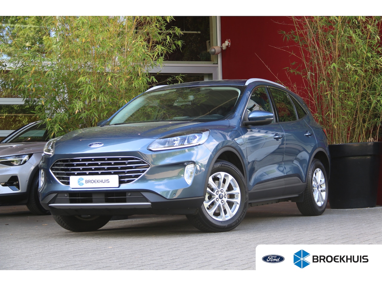 Ford Kuga - 2.5 PHEV Titanium Elek. Trekhaak | Clima | Stoel+stuurverw. | Cruise | 17'' - AutoWereld.nl