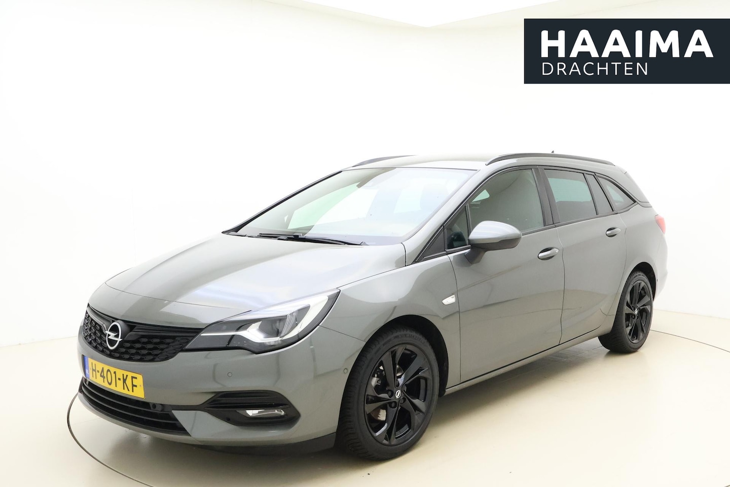 Opel Astra Sports Tourer - 1.4 Ultimate Automaat | Alcantara bekleding | Stoel en stuurverwarming | Climate control | - AutoWereld.nl