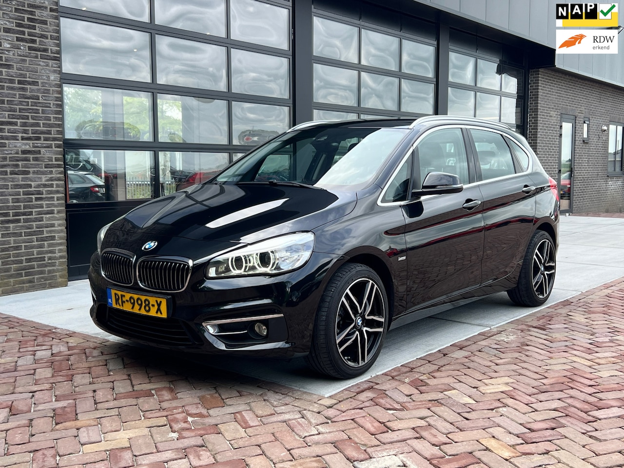 BMW 2-serie Active Tourer - 218i Executive | Autm | Leer | Navi | PDC | Stoelver | - AutoWereld.nl