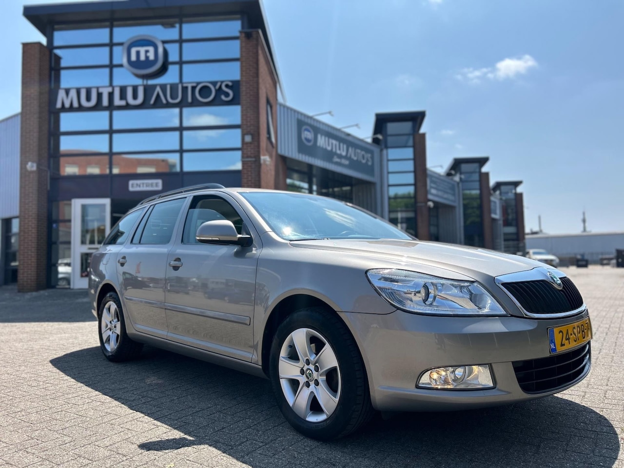 Skoda Octavia Combi - 1.2 TSI Ambition Business Line Airco NAP NAVI PDC APK - AutoWereld.nl