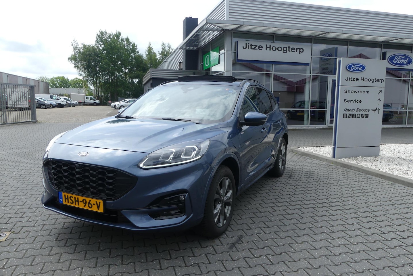 Ford Kuga - 2.5 PHEV ST-Line X ADAPTIEVE CRUISE, CLIMA, NAVI, PANO, HUD, WINTER PACK, ELEKTRISCHE TREK - AutoWereld.nl