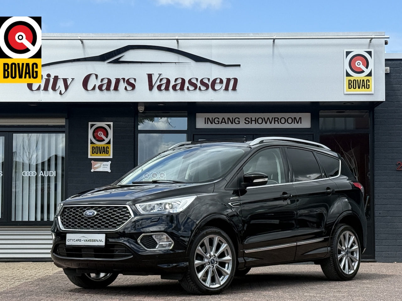 Ford Kuga - 1.5 EcoBoost Vignale awd automaat 176 pk full options panoramadak navi camera climate ctr - AutoWereld.nl