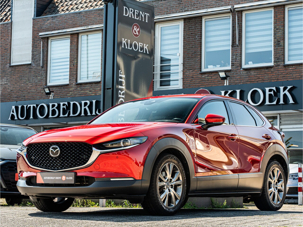 Mazda CX-30 - 2.0 e-SkyActiv-X M Hybrid Luxury BOSE LEDER TREKHAAK CAMERA DODEHOEK STOEL EN STUURVERW - AutoWereld.nl