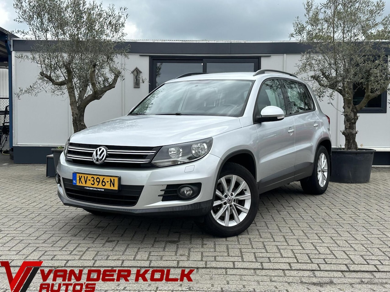 Volkswagen Tiguan - 1.4 TSI Sport&Style CarPlay Navi Cruise Climate - AutoWereld.nl