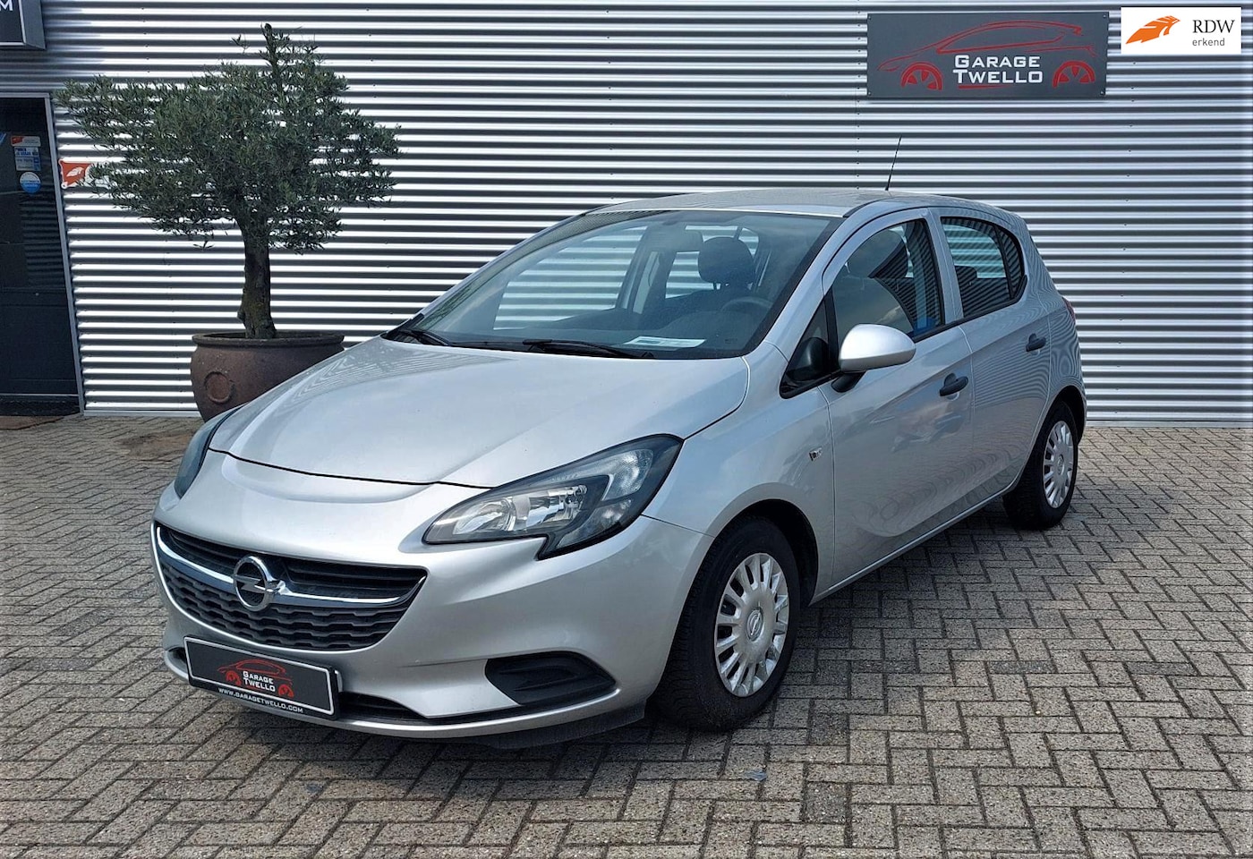 Opel Corsa - 1.2 airco ,cd-speler, metallic-lak, getint glas, - AutoWereld.nl