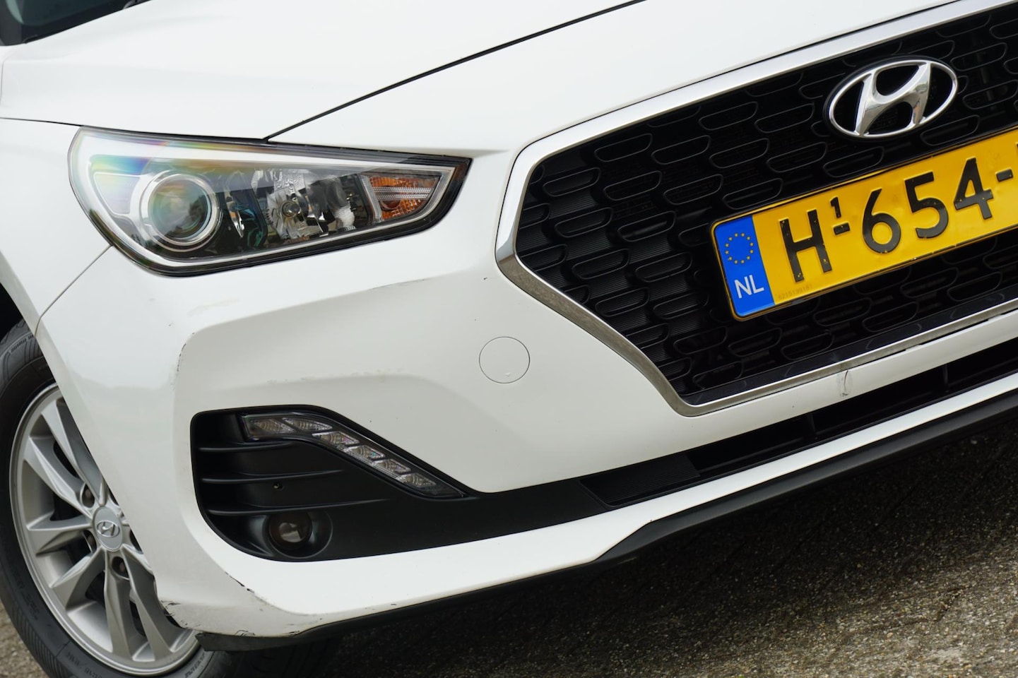 Hyundai i30 - 1.0 T-GDI Comfort Plus - Atlas White - Nav/PDC/LMV/Carplay - AutoWereld.nl