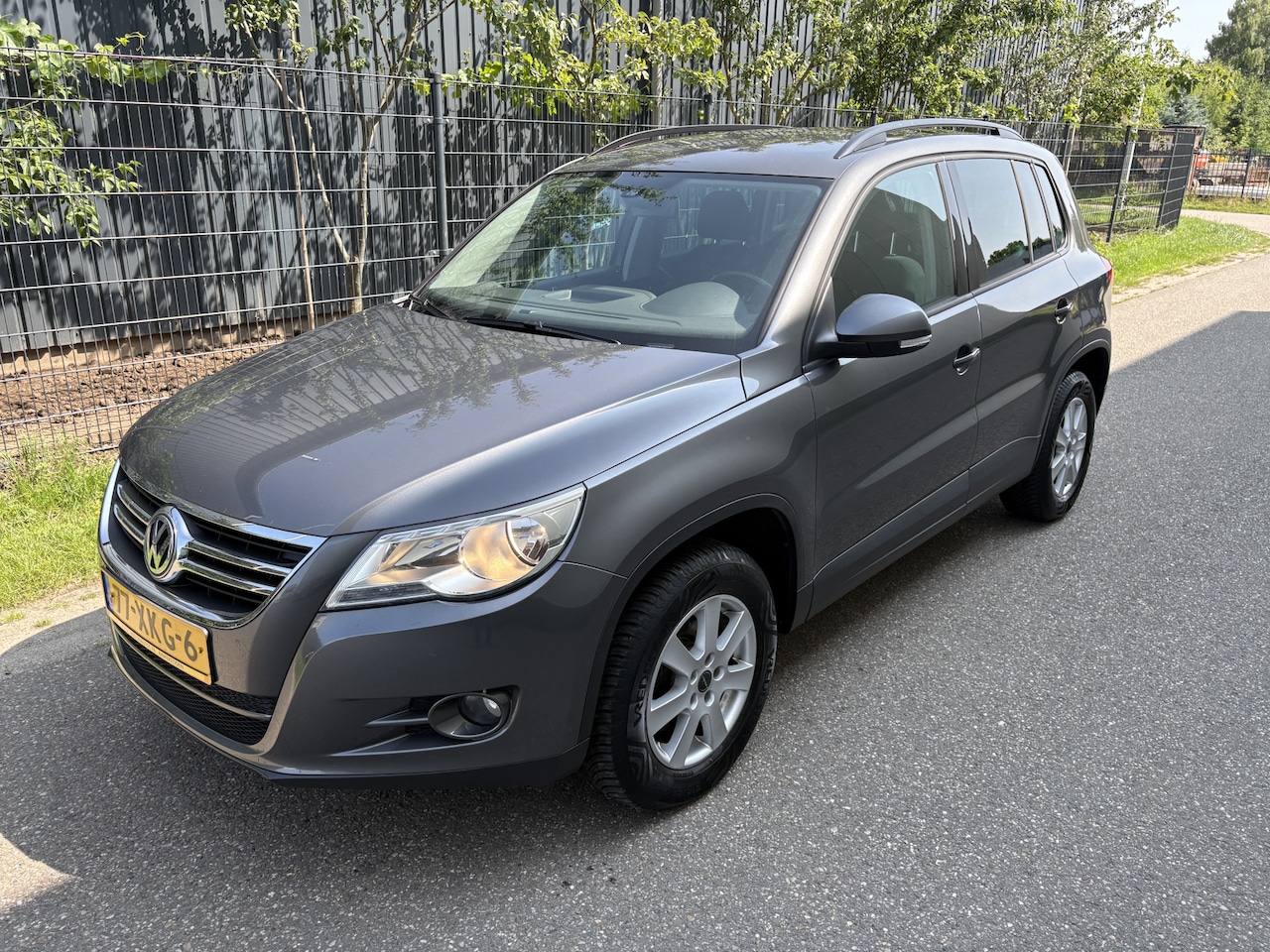 Volkswagen Tiguan - 1.4 TSI Comfort&Design / NAVI / CRUISE / AIRCO / STOELVERWARMING / 161dkm! - AutoWereld.nl