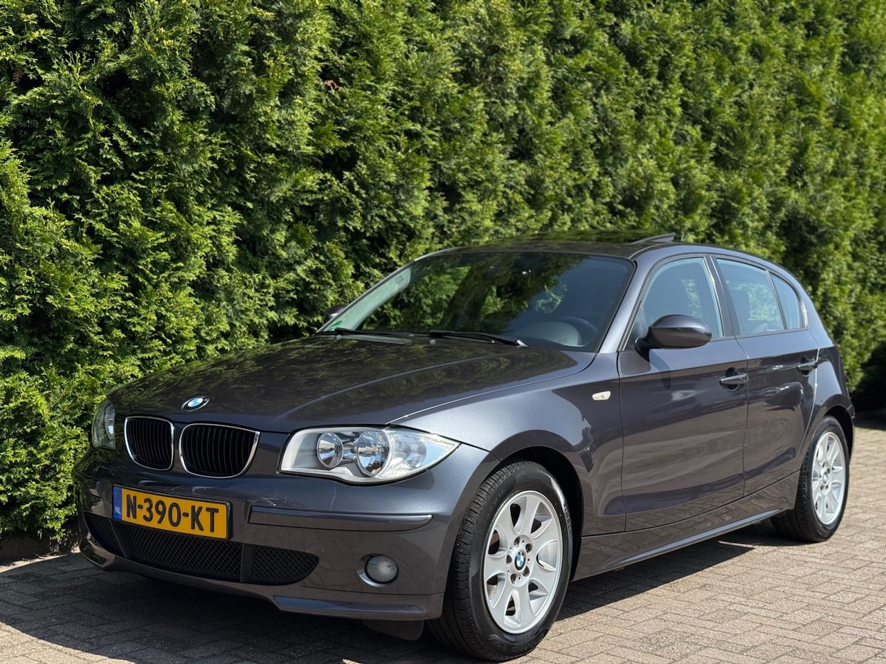 BMW 1-serie - 116i High Executive Airco Schuifdak - AutoWereld.nl
