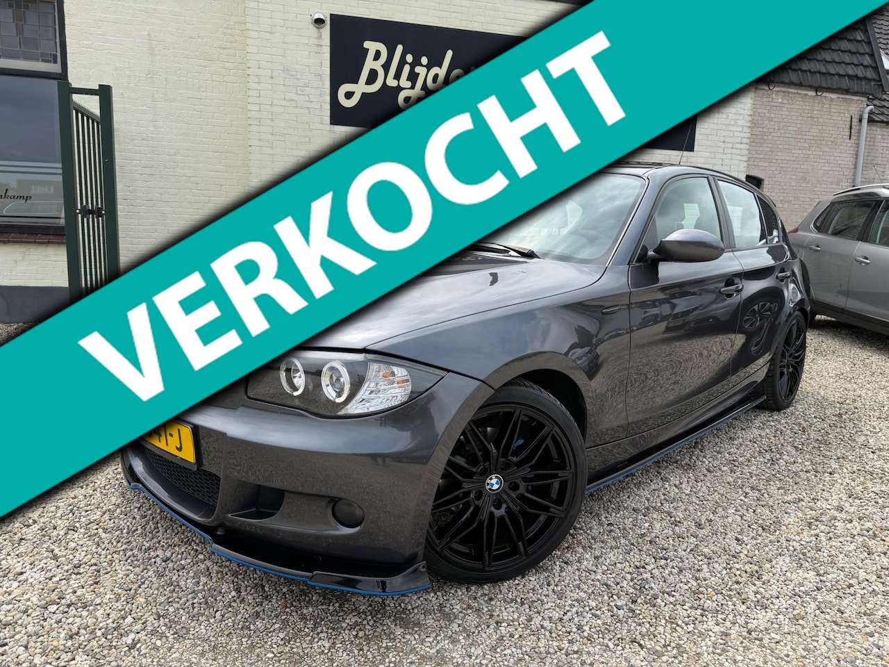BMW 1-serie - 118i M Performance Airco | Leer | PDC | Xenon | LM - AutoWereld.nl